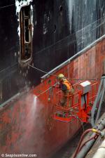 ID 3268 MONTE STELLO (1979/11630grt/IMO 7807093. ex-PALANGA, MONTE STELLO) receives a waterblasting of her hull while in drydock at the VT Fitzroy drydock in Auckland, New Zealand.